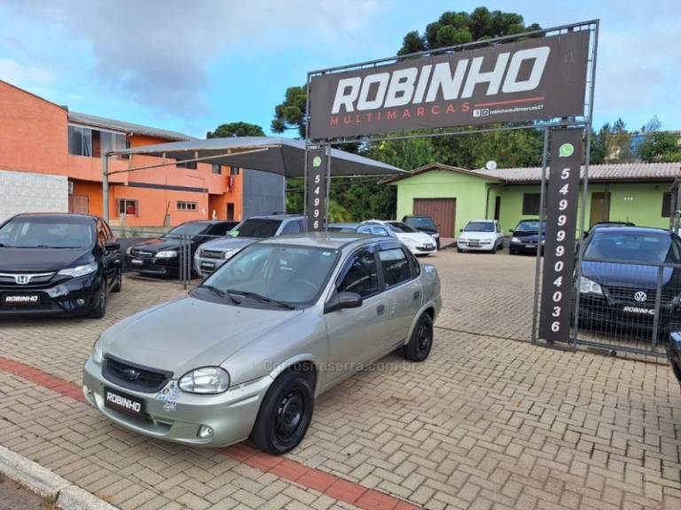 CHEVROLET - CORSA - 2009/2010 - Dourada - R$ 21.900,00